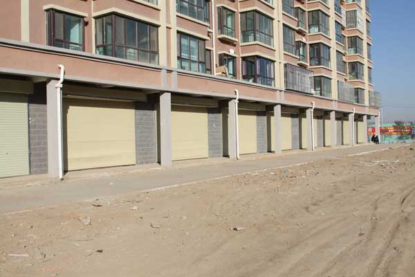 蘭州市高新開發(fā)區(qū)經(jīng)濟(jì)適用房工業(yè)門案例 - 中出網(wǎng)-智能出入口與停車充電門戶