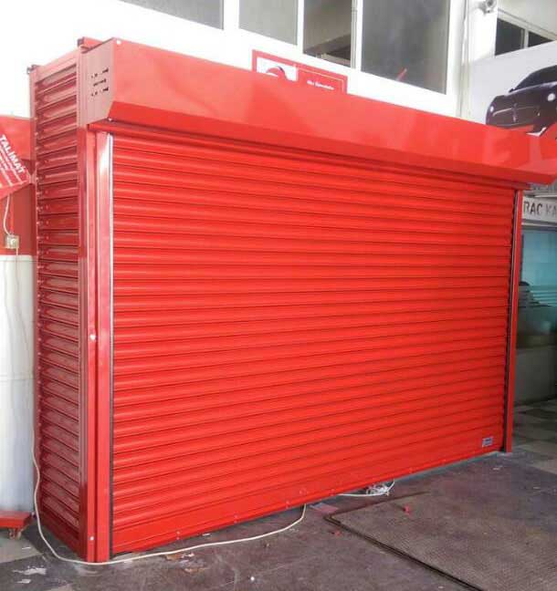 紅色鋼制防風(fēng)電動卷簾門帶包廂